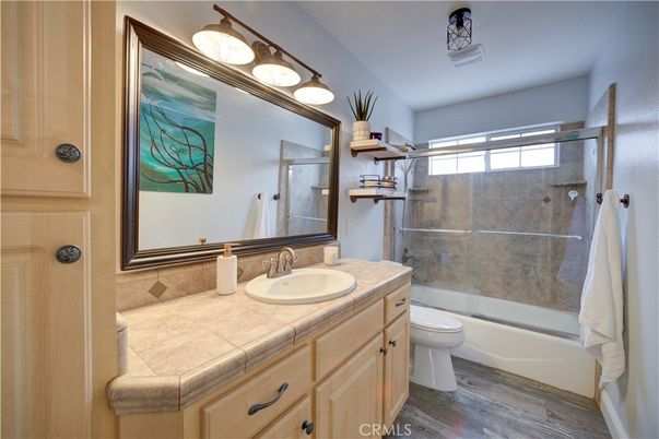 Bathroom, Glass Shower, Interior, Tile Countertops, Wood Texture Flooring