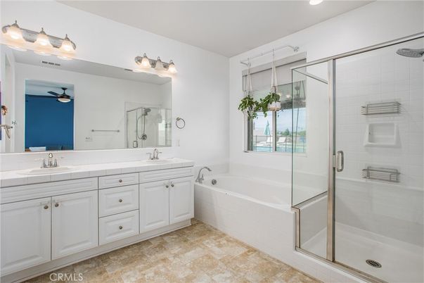 Bathroom, Dual Sink Vanities, Glass Shower, Interior, Recessed Lighting, Tile Countertops