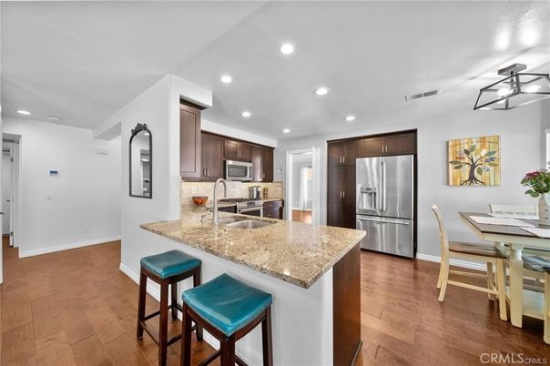 Dining room, Interior, Kitchen, Recessed Lighting, Stainless Steel Appliances, Wood Texture Flooring