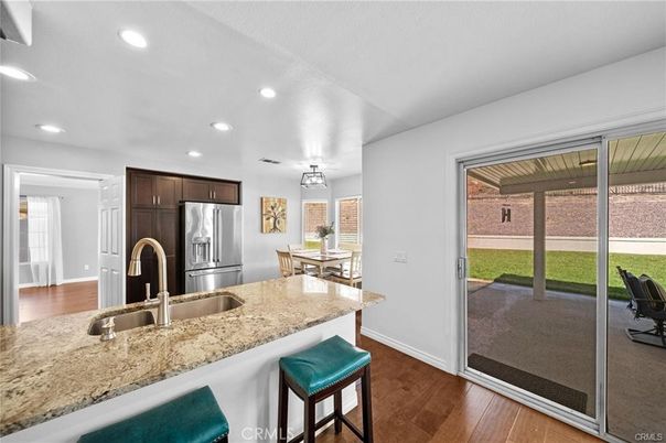 Dining room, Interior, Kitchen, Recessed Lighting, Stainless Steel Appliances, Wood Texture Flooring