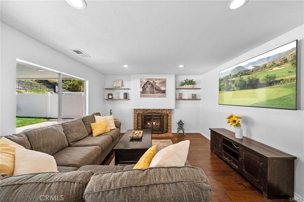 Fireplace, Interior, Living room, Recessed Lighting, Wood Texture Flooring