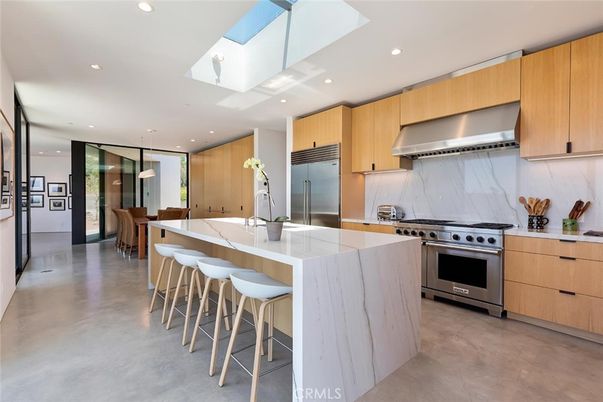 Interior, Kitchen, Marble Walls, Pendant Lights, Recessed Lighting, Stainless Steel Appliances