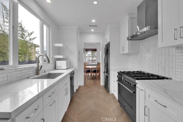 Dining room, Interior, Kitchen, Recessed Lighting, Stainless Steel Appliances, Wood Texture Flooring