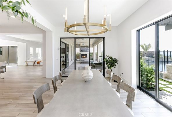 Dining room, Fireplace, Interior, Pendant Lights, Recessed Lighting, Wood Texture Flooring