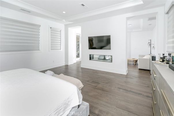 Bedroom, Fireplace, Interior, Recessed Lighting, Wood Texture Flooring