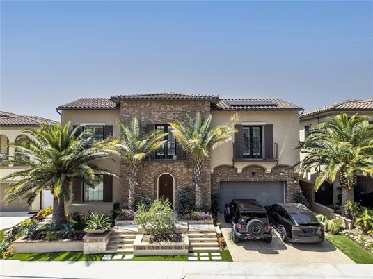 Attached, Exterior, Facade, Brick Facade, Solar Panels, Mediterranean
