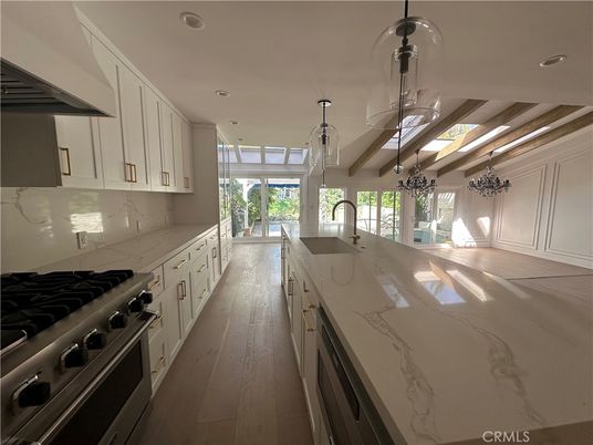 Interior, Kitchen, Marble Walls, Pendant Lights, Recessed Lighting, Wood Texture Flooring