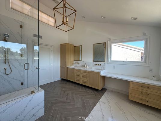 Bathroom, Dual Sink Vanities, Glass Shower, Interior, Pendant Lights, Recessed Lighting, Wood Texture Flooring