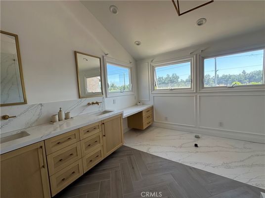 Bathroom, Dual Sink Vanities, Interior, Marble, Recessed Lighting, Wood Texture Flooring