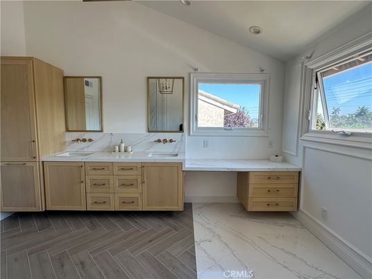 Bathroom, Dual Sink Vanities, Interior, Marble, Recessed Lighting, Wood Texture Flooring