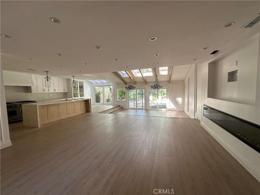 Fireplace, Interior, Kitchen, Marble Walls, Recessed Lighting, Wood Texture Flooring