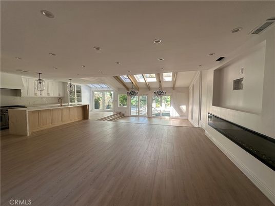 Fireplace, Interior, Kitchen, Marble Walls, Recessed Lighting, Wood Texture Flooring