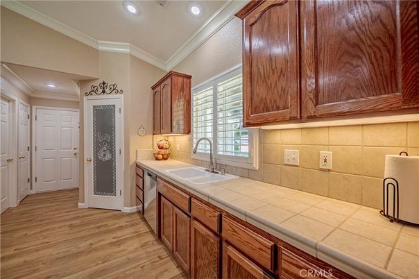 Interior, Kitchen, Recessed Lighting, Tile Countertops, Wood Texture Flooring