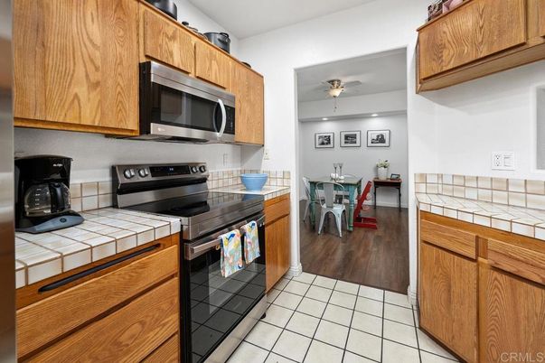Dining room, Interior, Kitchen, Recessed Lighting, Tile Countertops, Wood Texture Flooring