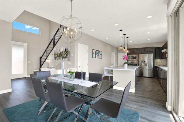 Chandelier, Dining room, Interior, Kitchen, Pendant Lights, Recessed Lighting, Stainless Steel Appliances, Wood Texture Flooring
