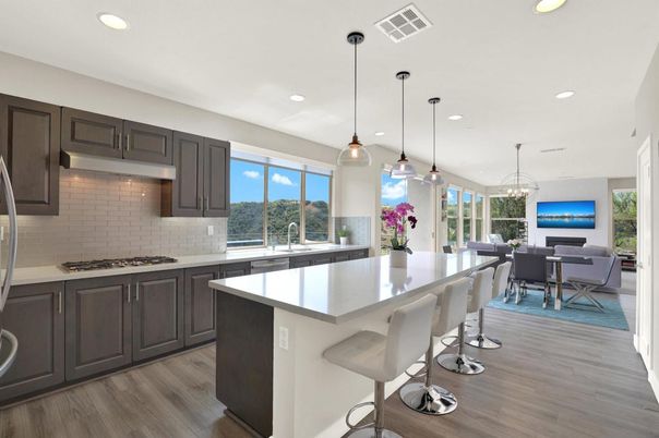 Dining room, Interior, Kitchen, Pendant Lights, Recessed Lighting, Stainless Steel Appliances, Wood Texture Flooring