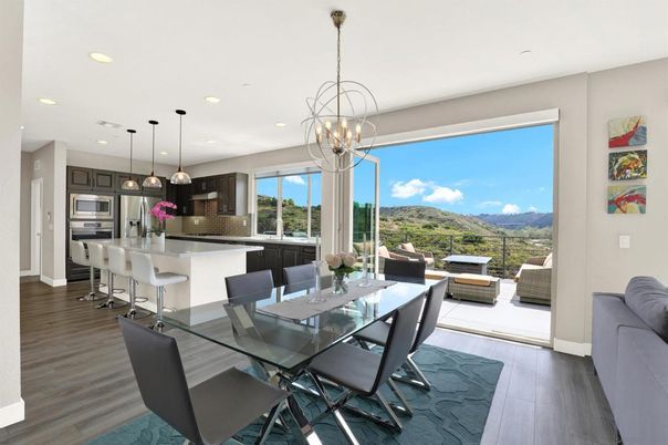 Chandelier, Dining room, Interior, Kitchen, Pendant Lights, Recessed Lighting, Stainless Steel Appliances, Wood Texture Flooring