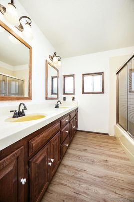 Bathroom, Dual Sink Vanities, Glass Shower, Interior, Wood Texture Flooring