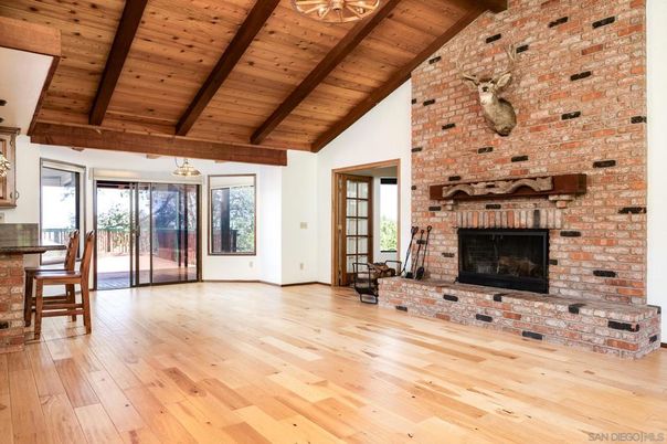 Empty room, Fireplace, Interior, Stone Walls, Wooden Beams, Wooden Ceilings, Wood Texture Flooring