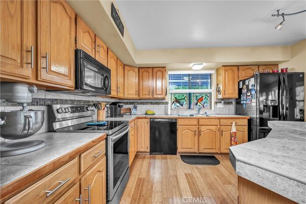 Interior, Kitchen, Tile Countertops, Wood Texture Flooring