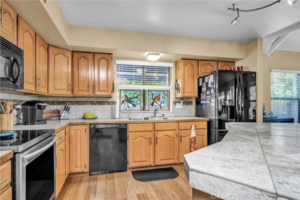 Interior, Kitchen, Tile Countertops, Wood Texture Flooring