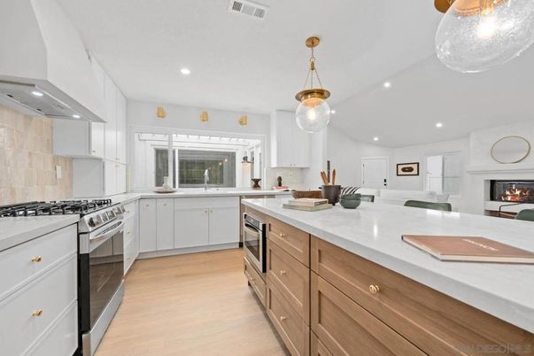 Fireplace, Interior, Kitchen, Pendant Lights, Recessed Lighting, Stainless Steel Appliances, Wood Texture Flooring