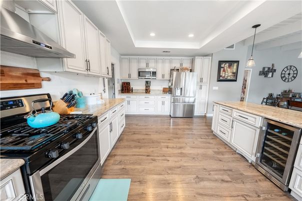 Interior, Kitchen, Pendant Lights, Recessed Lighting, Stainless Steel Appliances, Wood Texture Flooring