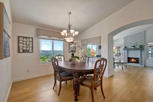 Chandelier, Dining room, Fireplace, Interior, Stone Walls, Wood Texture Flooring