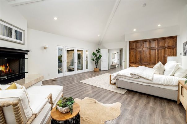 Bedroom, Fireplace, Interior, Recessed Lighting, Wood Texture Flooring