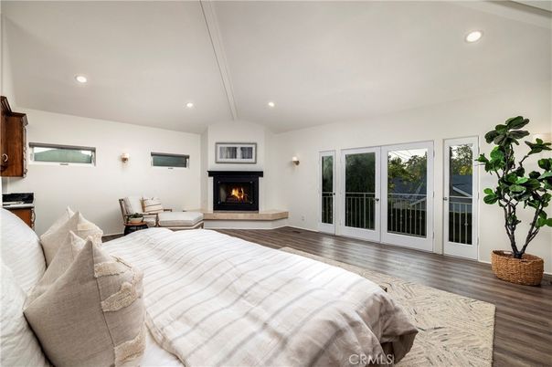 Bedroom, Fireplace, Interior, Recessed Lighting, Wood Texture Flooring