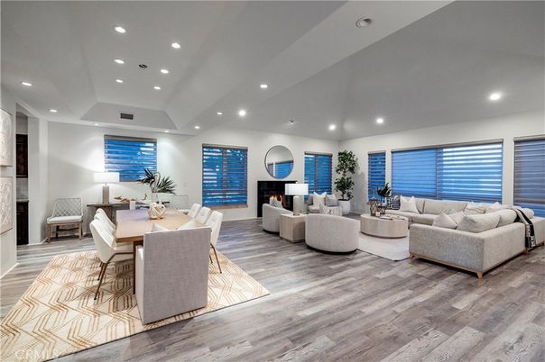 Dining room, Fireplace, Interior, Living room, Recessed Lighting, Wood Texture Flooring