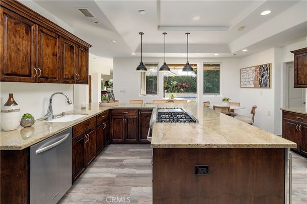 Dining room, Interior, Kitchen, Pendant Lights, Recessed Lighting, Stainless Steel Appliances, Wood Texture Flooring
