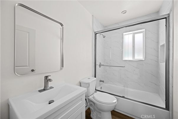 Bathroom, Glass Shower, Interior, Marble Walls, Recessed Lighting, Wood Texture Flooring