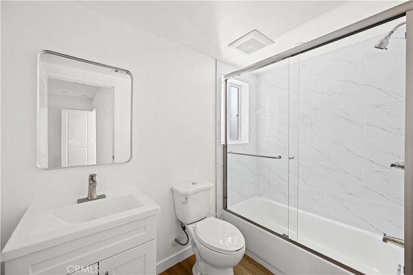 Bathroom, Glass Shower, Interior, Marble Walls, Wood Texture Flooring