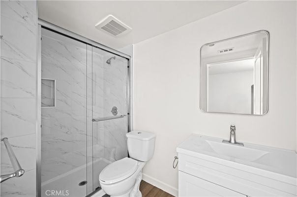 Bathroom, Glass Shower, Interior, Marble Walls, Wood Texture Flooring