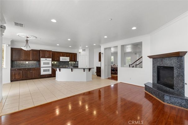 Fireplace, Interior, Kitchen, Recessed Lighting, Wood Texture Flooring