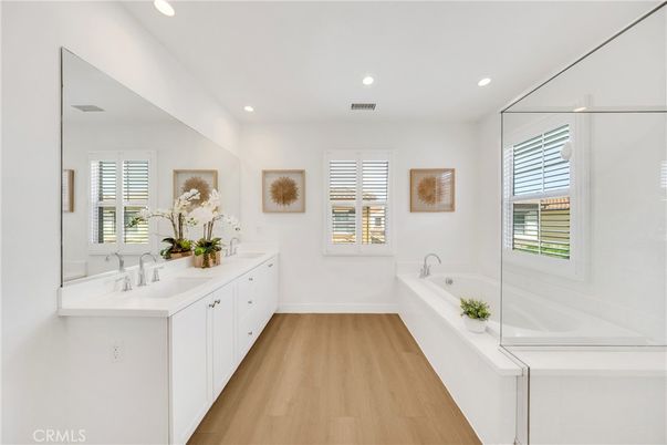 Bathroom, Dual Sink Vanities, Interior, Recessed Lighting, Wood Texture Flooring