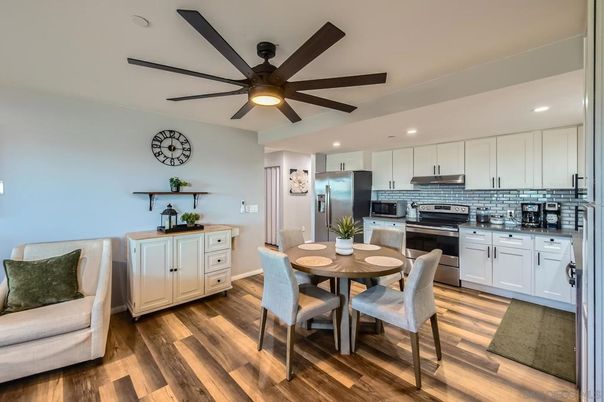 Dining room, Interior, Kitchen, Recessed Lighting, Stainless Steel Appliances, Wood Texture Flooring