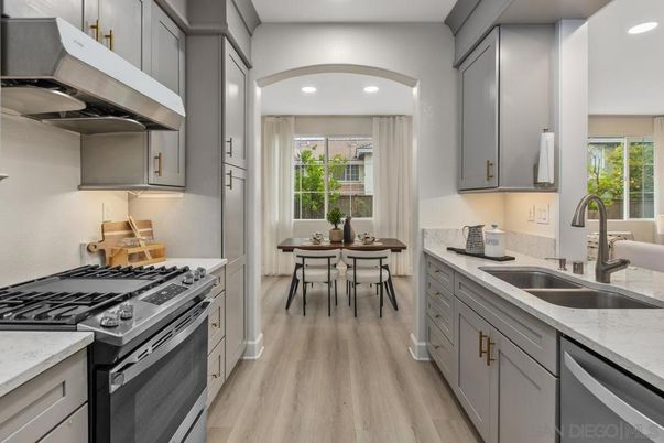 Dining room, Interior, Kitchen, Recessed Lighting, Stainless Steel Appliances, Wood Texture Flooring