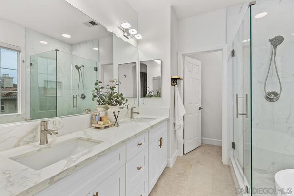 Bathroom, Dual Sink Vanities, Glass Shower, Interior, Marble Walls, Recessed Lighting