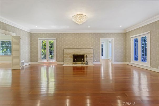 Chandelier, Empty room, Fireplace, Interior, Recessed Lighting, Wood Texture Flooring