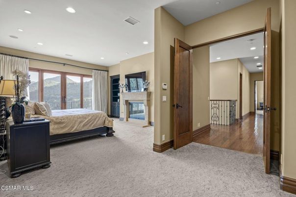 Bedroom, Fireplace, Interior, Recessed Lighting, Wood Texture Flooring