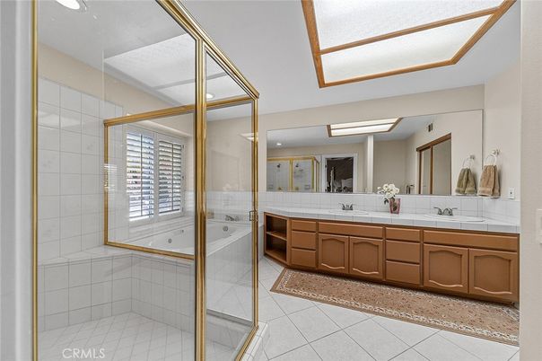Bathroom, Dual Sink Vanities, Glass Shower, Interior, Recessed Lighting, Tile Countertops