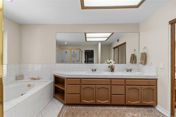 Bathroom, Dual Sink Vanities, Interior, Recessed Lighting, Tile Countertops