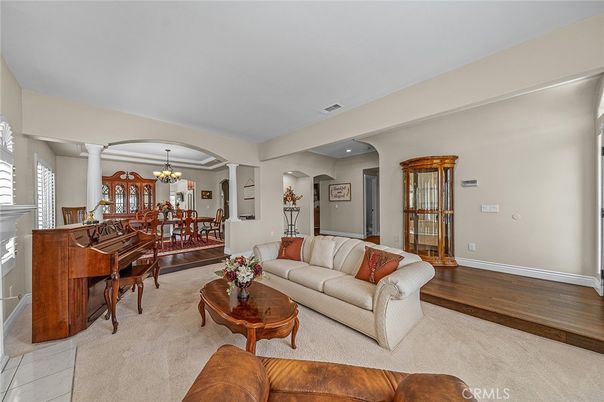 Chandelier, Dining room, Interior, Living room, Piano, Recessed Lighting, Wood Texture Flooring