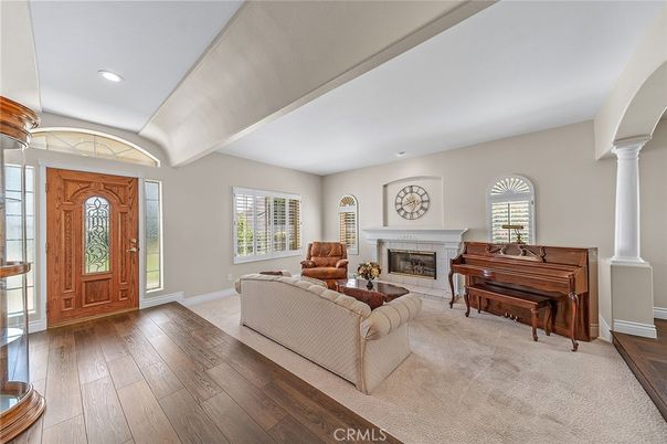 Fireplace, Interior, Living room, Piano, Recessed Lighting, Wood Texture Flooring