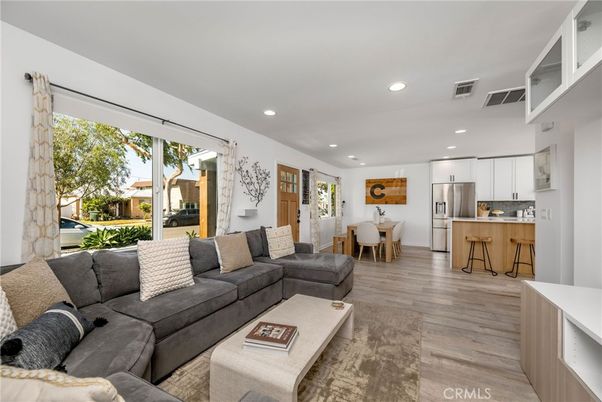 Dining room, Interior, Kitchen, Living room, Recessed Lighting, Stainless Steel Appliances, Wood Texture Flooring