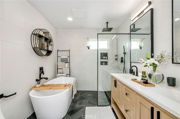 Bathroom, Dual Sink Vanities, Free Standing Baths, Glass Shower, Interior, Marble Walls, Recessed Lighting