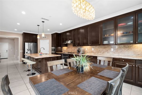 Chandelier, Dining room, Interior, Kitchen, Pendant Lights, Recessed Lighting, Stainless Steel Appliances