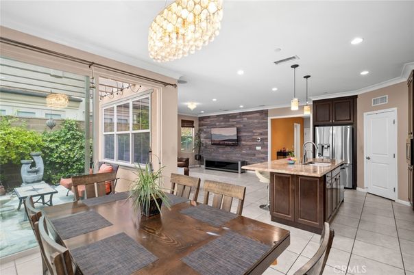 Dining room, Fireplace, Interior, Kitchen, Pendant Lights, Recessed Lighting, Stainless Steel Appliances
